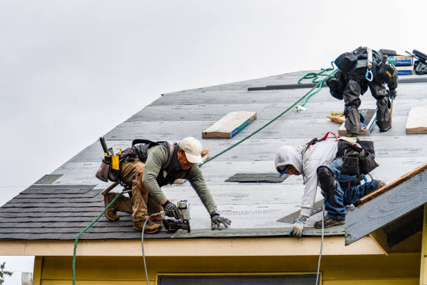Professional Gutter Installation technician working in Weatherford, TX